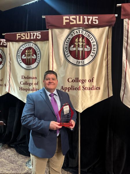 Kyle Hodgen with teaching award