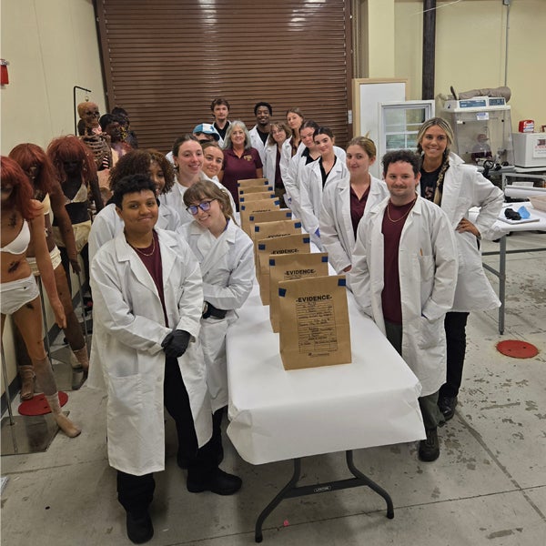 CSI students gather before a final exam during which they will examine evidence and draw conclusions. 