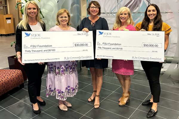 The St. Joe Community Foundation on Monday presented a pair of donations totaling $80,000