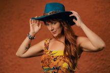 Britt Matthews in cowboy hat