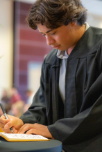 First-Year student signing book 16