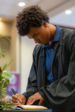 First-Year student signing book 22