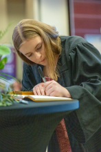 First-Year student signing book 27