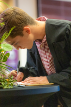 First-Year student signing book 28