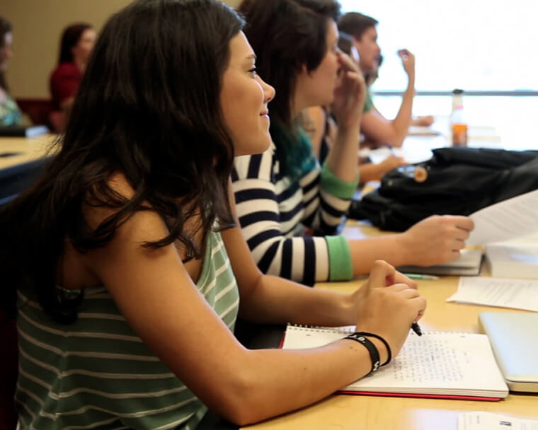 students sitting a desk