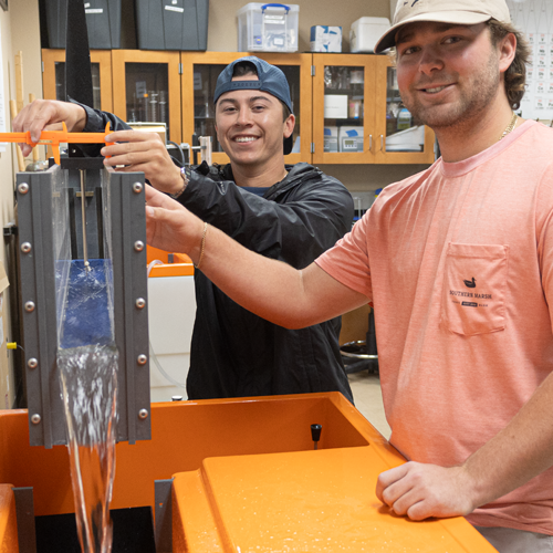 civil engineering students working in lab